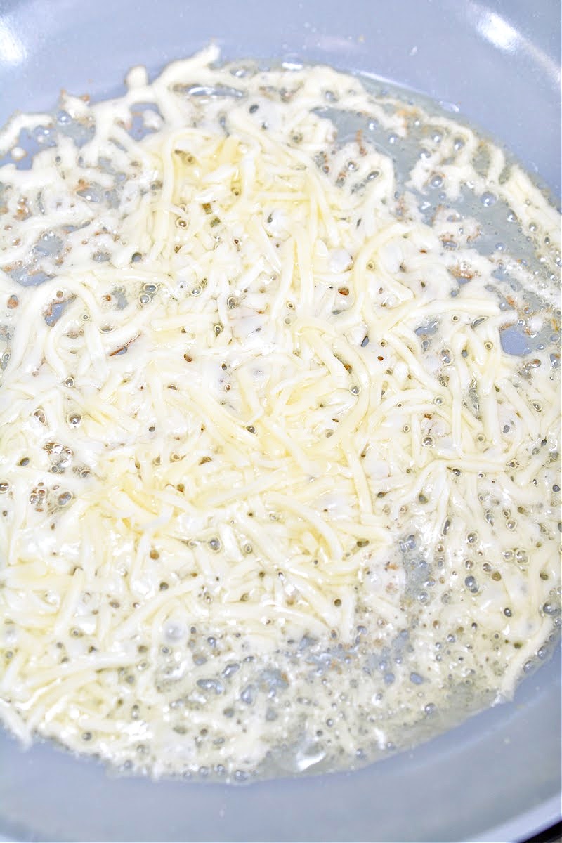 Cooking shredded cheese in a skillet