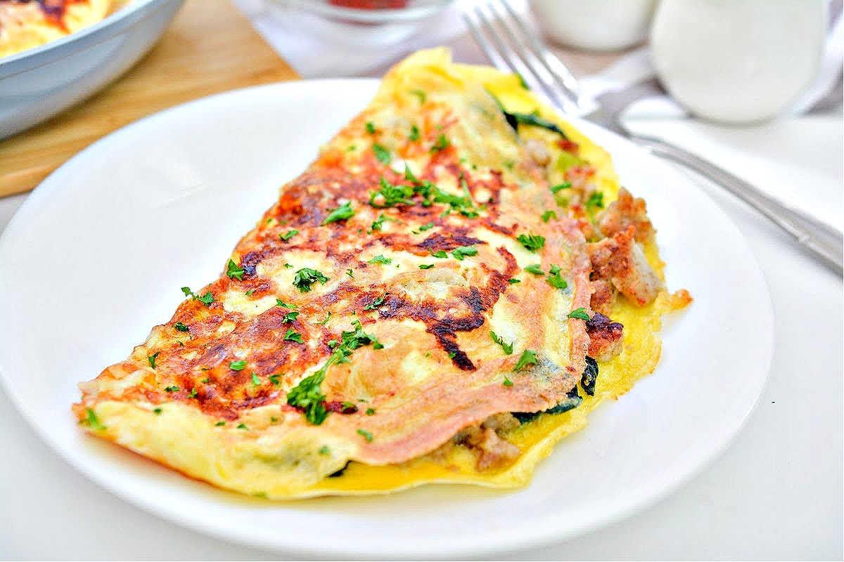 An inside out omelette on a white plate