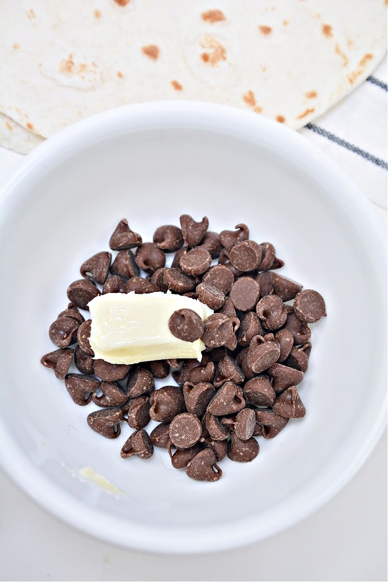 A bowl of keto chocolate chips and butter