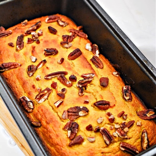 Keto Pecan Pumpkin Bread baked in a loaf pan