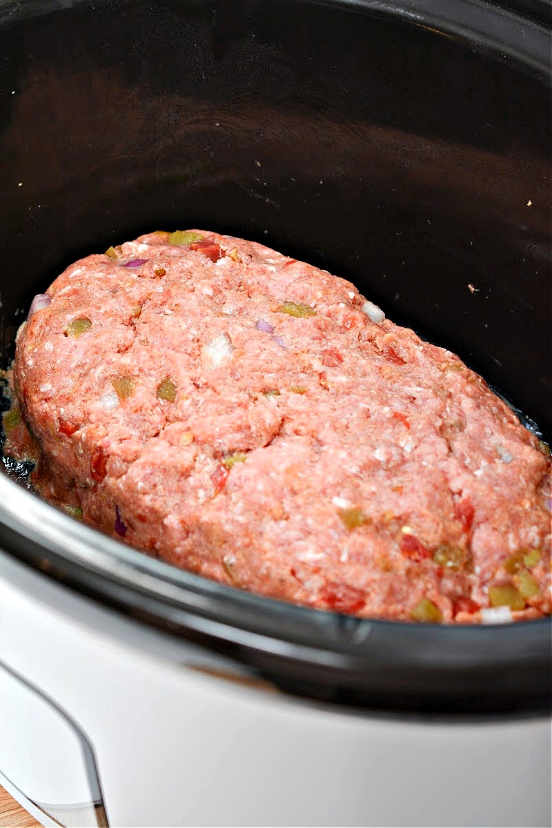 Keto Slow Cooker Taco Meatloaf uncooked in the slow cooker